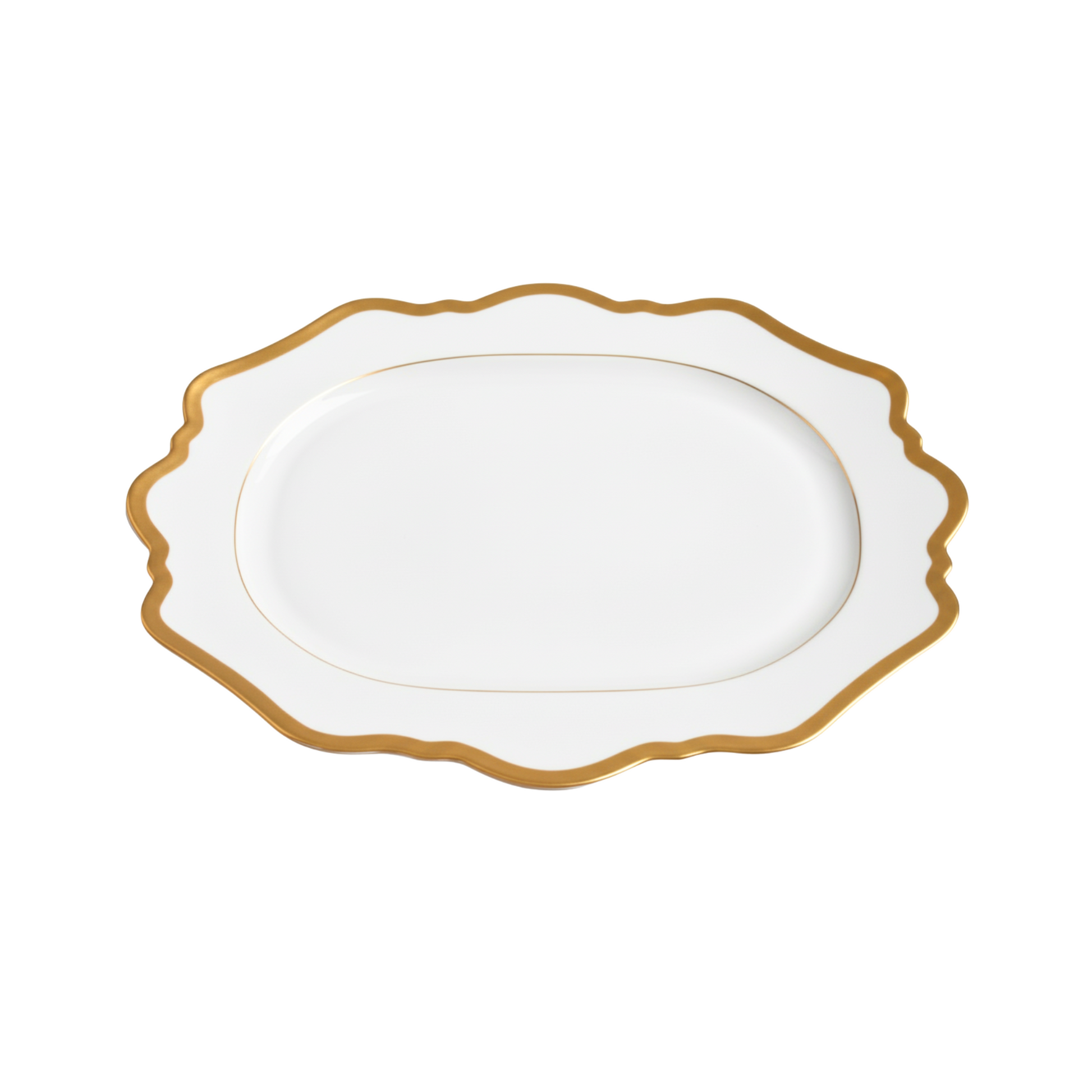 White porcelain platter with gold rim on a white background