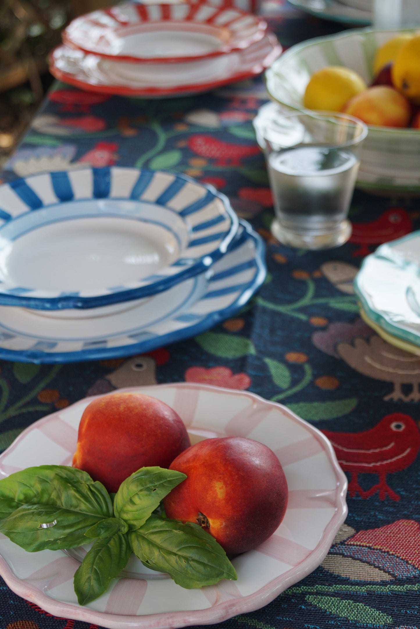 Table setting with colorful striped plates