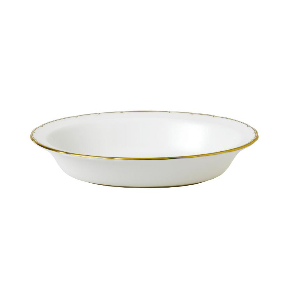 A white fine bone china serving bowl with a scalloped gold rim.