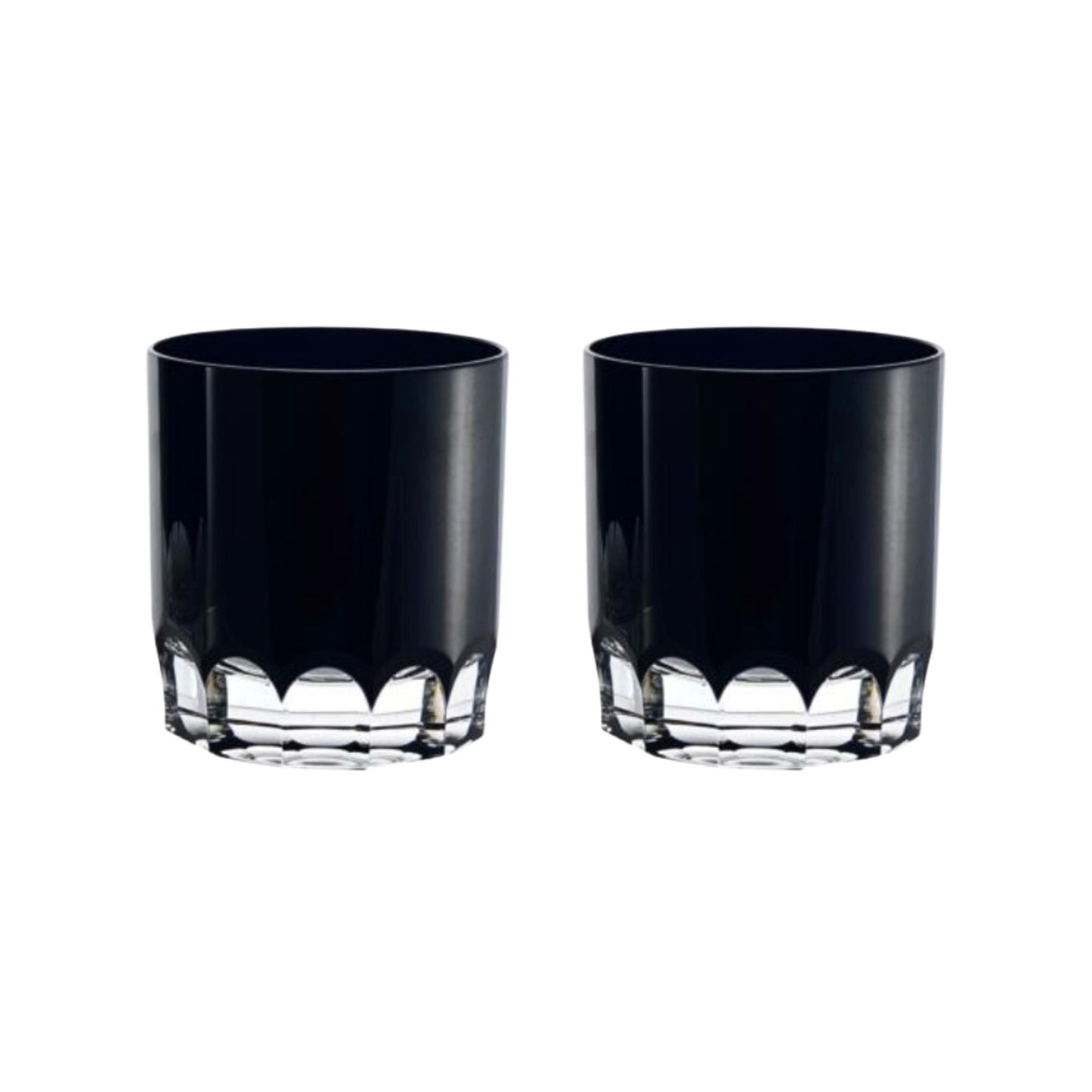 Two black crystal tumblers with decorative bases on a white background