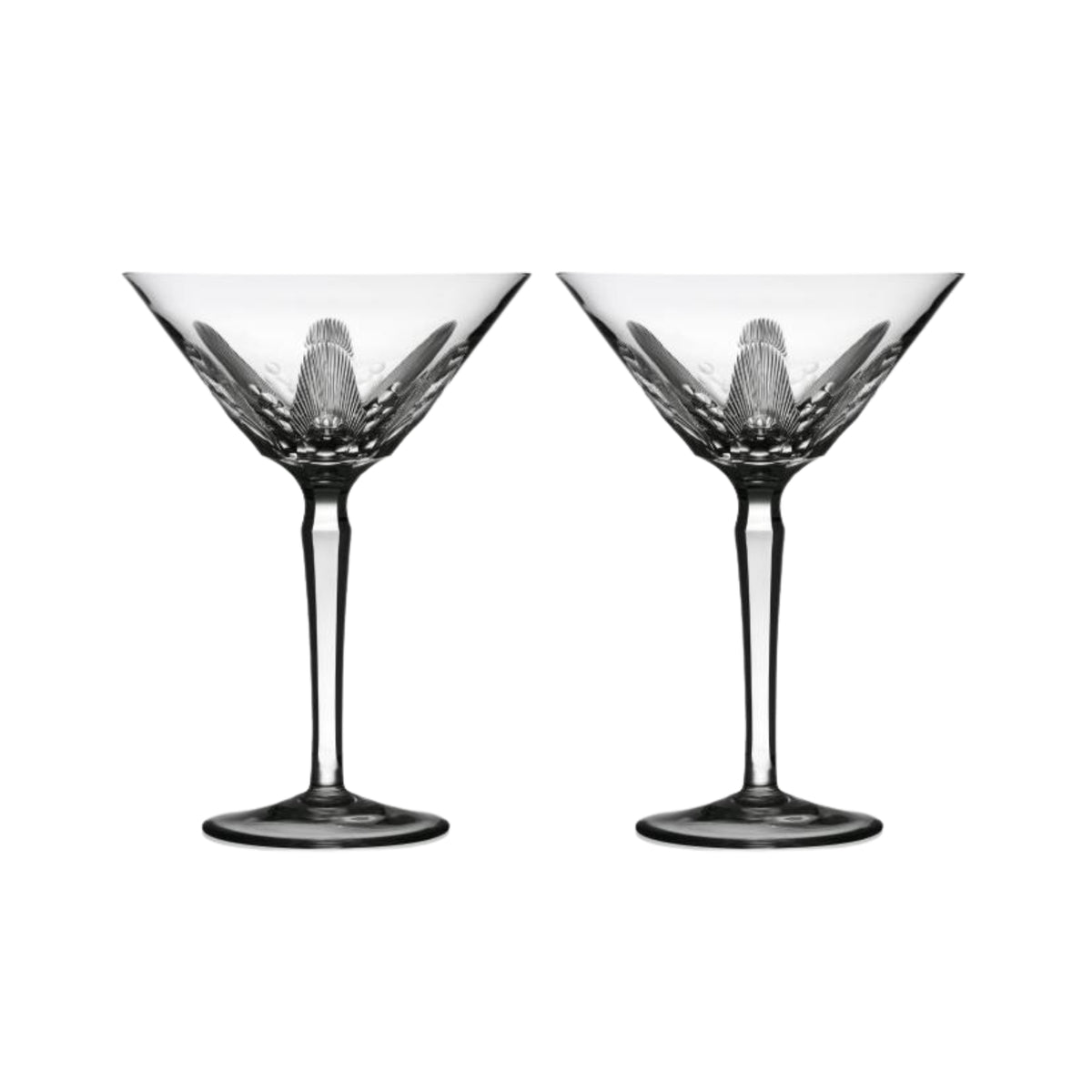 Two clear crystal martini glasses with cut design on a white background