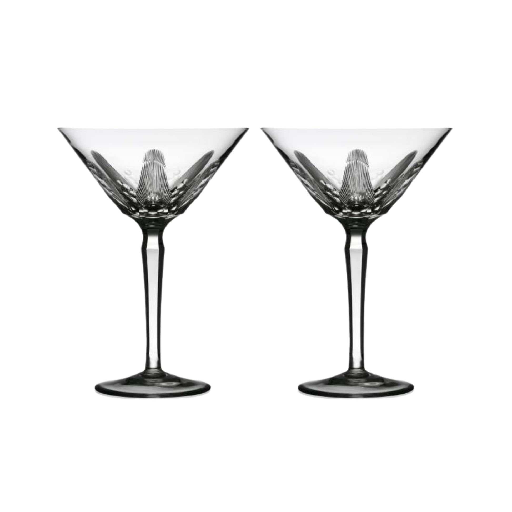 Two clear crystal martini glasses with cut design on a white background