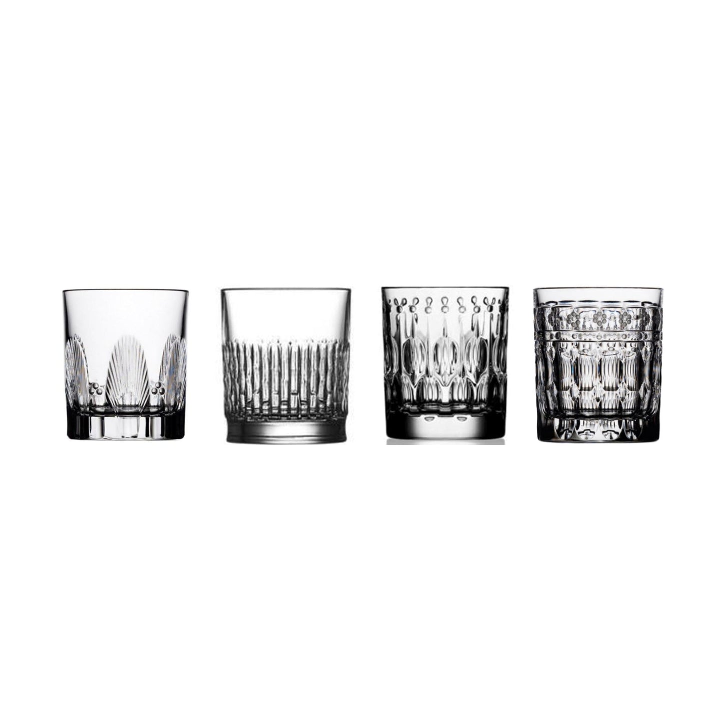 Four crystal shot glasses with different cuts on a white background