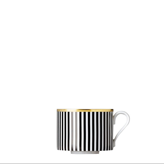 A black and white geometric patterned porcelain coffee cup with gold accents on a white background.