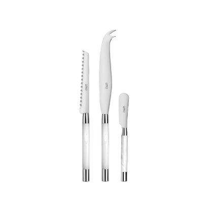 Set of white cheese knives with silver and white handles on a white background