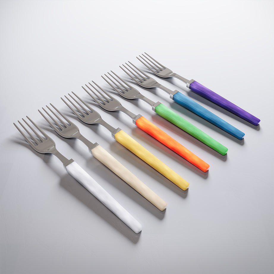 Set of forks with colorful handles on a light gray background