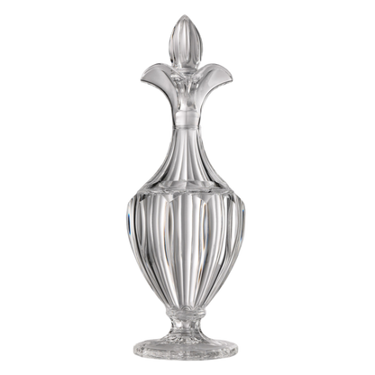 A clear, crystal-like carafe with a geometric pattern design.