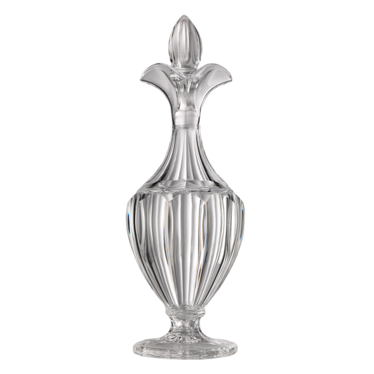 A clear, crystal-like carafe with a geometric pattern design.