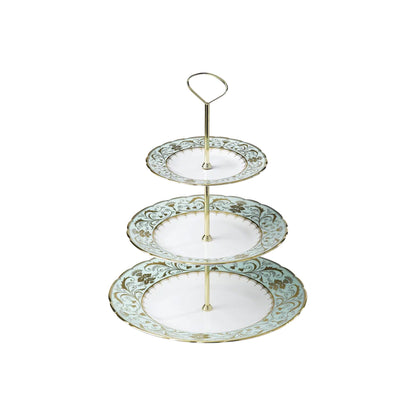 Three-tiered luxury decorative plate stand with gold accents on a white background