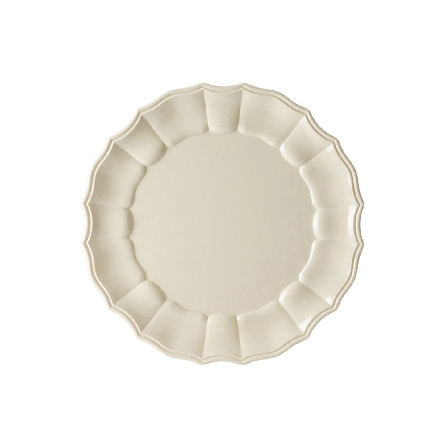 Ivory acrylic plate with scalloped edge on a white background