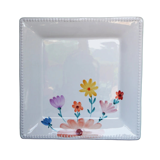 Square ceramic plate with floral designs 