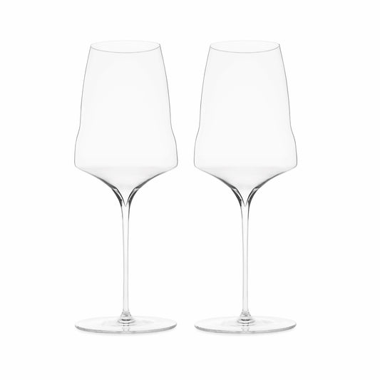 A pair of clear luxury wine glasses with a slender stem and a slight curve at the bowl, displayed against a white background.