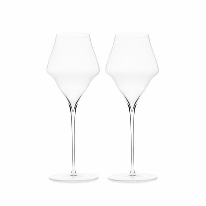 Two clear glasses of champagne with a narrow design and a deep pointed tip, displayed against a white background.