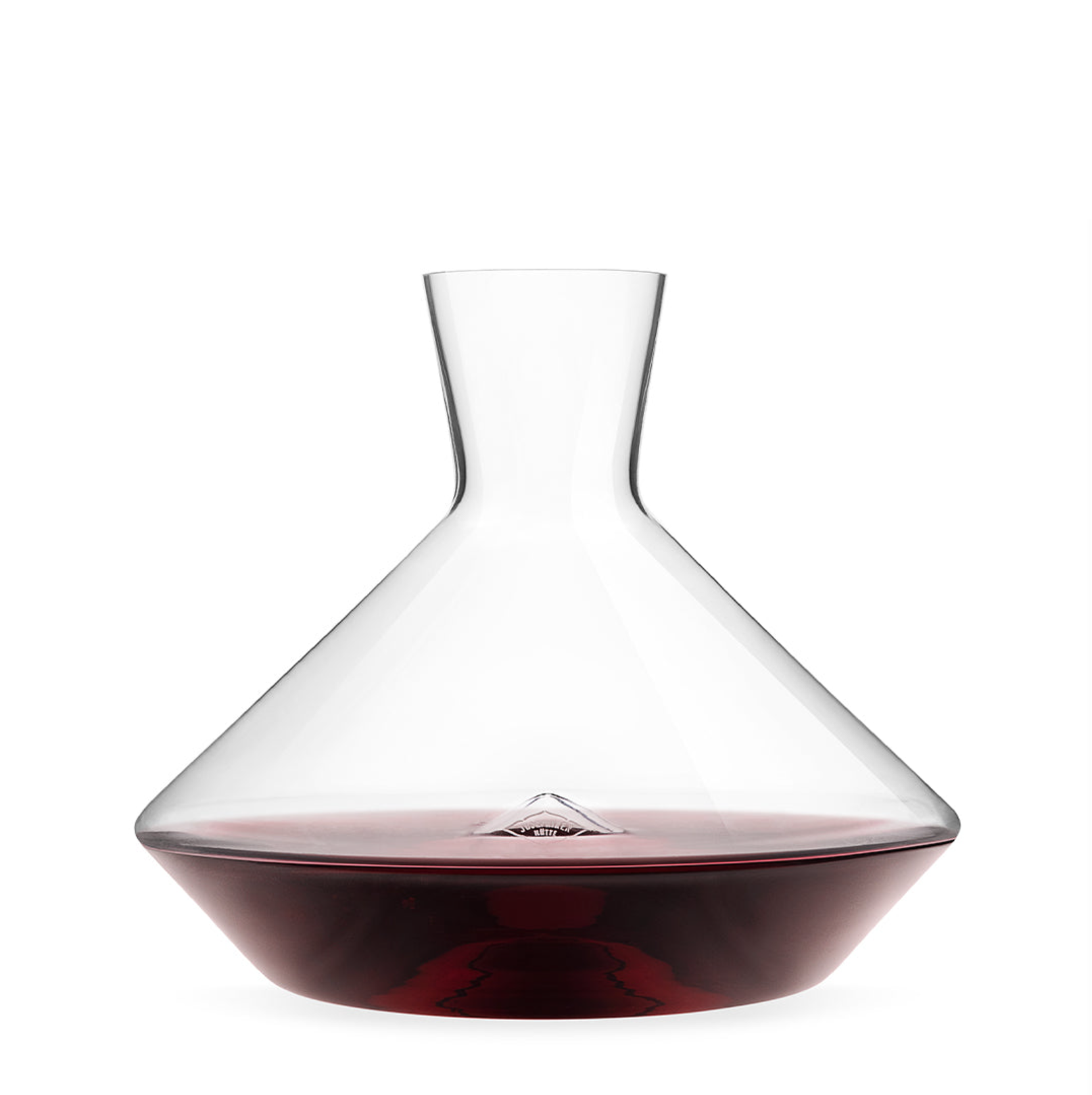 Hand blown decanter filled with red wine