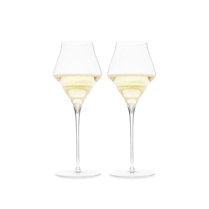 Two luxury champagne glasses filled with champagne on a white background