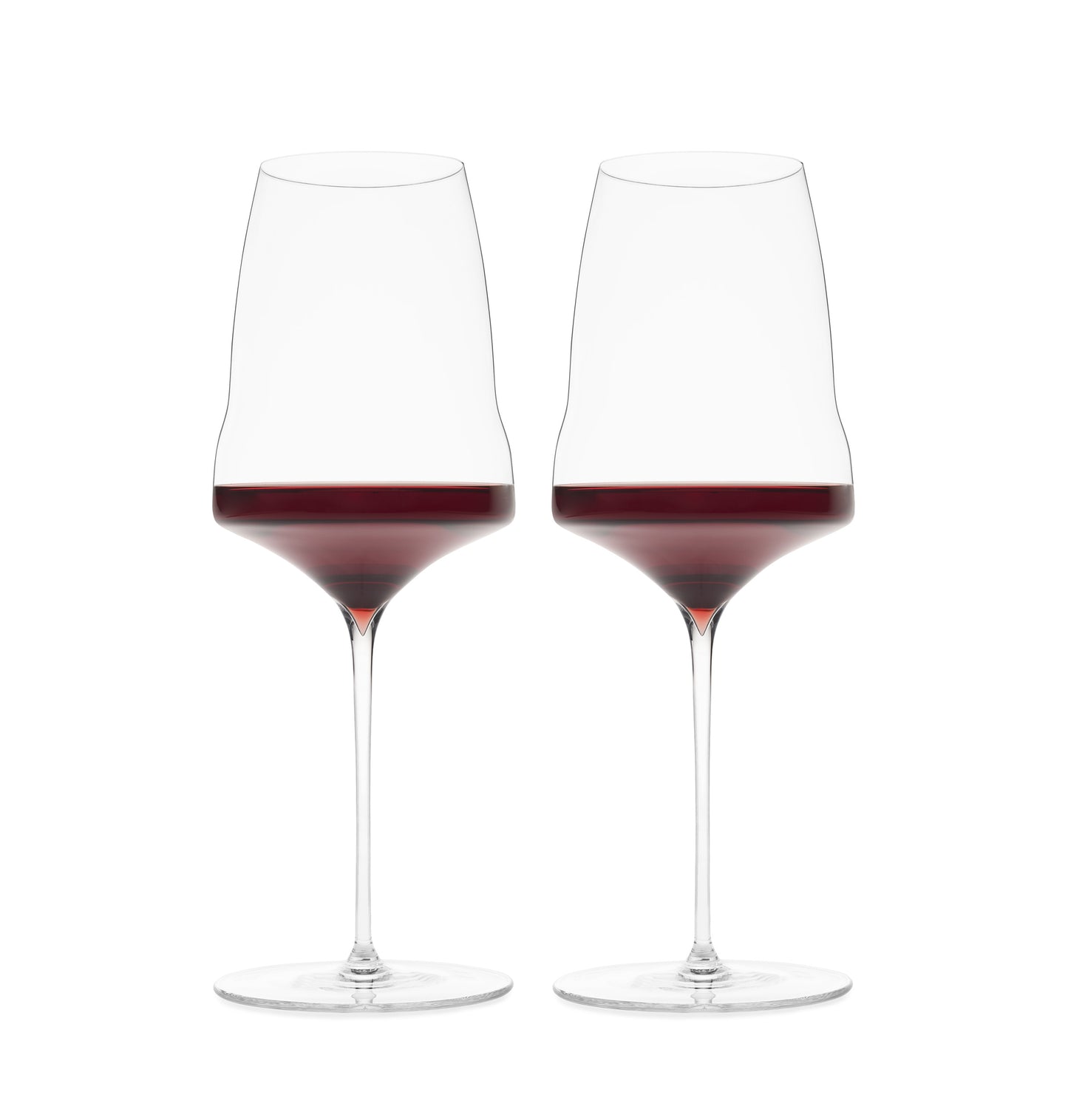 Two premium hand-blown wine glasses filled with red wine on a white background