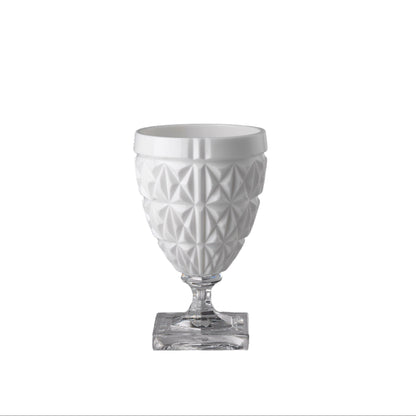 A white acrylic tumbler with geometric cut patterns, displayed against a neutral background.