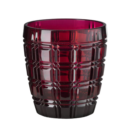 A red acrylic tumbler with a geometric pattern.