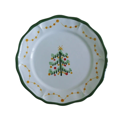 Decorative plate with a Christmas tree design on a white background