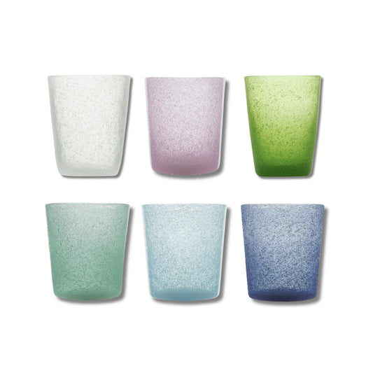 Set of six colorful glass tumblers on a white background