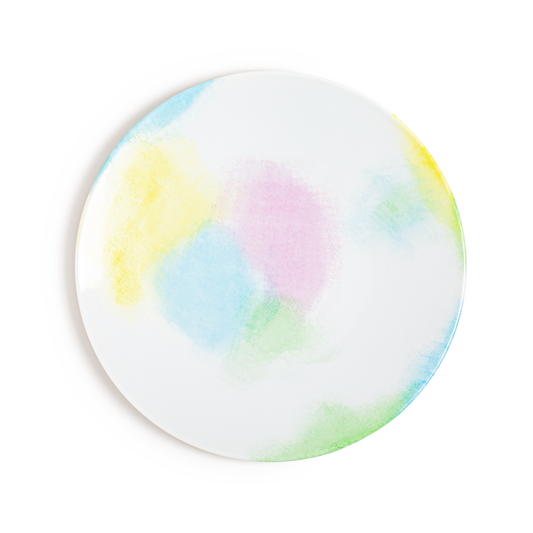A Limoges porcelain plate with a hand-painted design featuring slightly acid pastel shades creating a powdery effect.