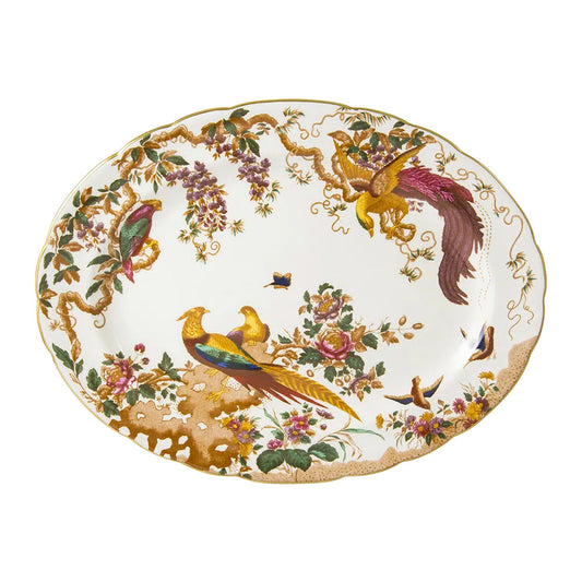 Decorative platter with birds and floral patterns on a white background