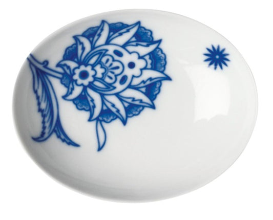 A ceramic bowl with a white base color and blue floral patterns.