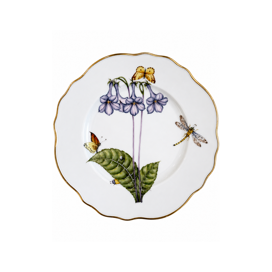 Decorative plate with floral and insect design on a white background