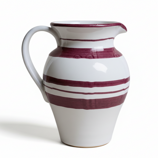 White ceramic pitcher with purple stripes 
