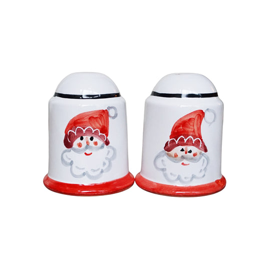 Two ceramic shakers with snowman design on a white background