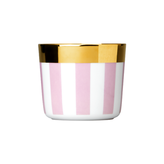 A white porcelain champagne tumbler with vertical pink stripes and a gold rim at the top.
