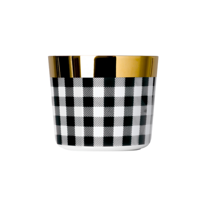 Luxury tumbler with black and white checkered pattern and gold accents on a white background
