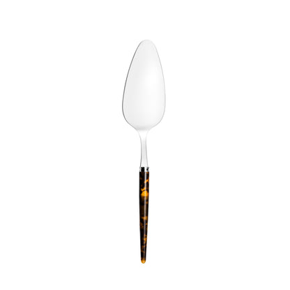 Pastry server with tortoiseshell handle on a white background