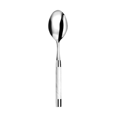 Silver spoon with a white handle on a white background