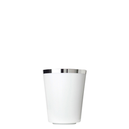White porcelain coffee cup with a silver rim on a white background